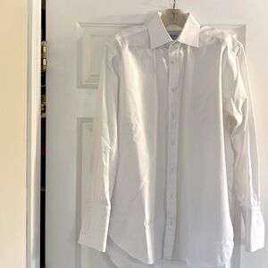 Men’s 100% cotton white dress shirt with French cuffs. 15 1/2 neck, 32” sleeve.